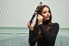 woman using the clipless Curler set