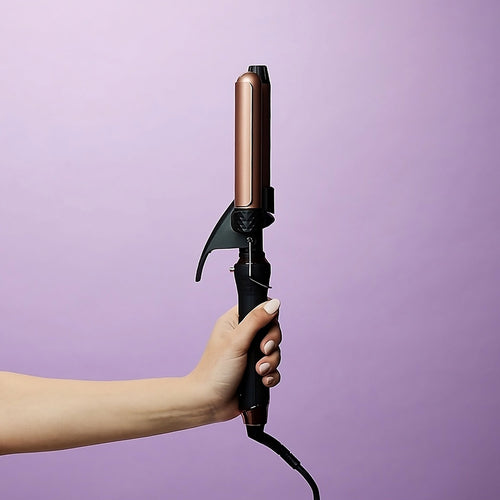 hand-holding-interchangeable-curler-base-with-waver-attached-purple-background-side-profile