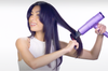 woman-blowing-her-hair-with-airpro-blow-dryer