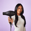 woman-holding-bd2-infrared-blow-dryer
